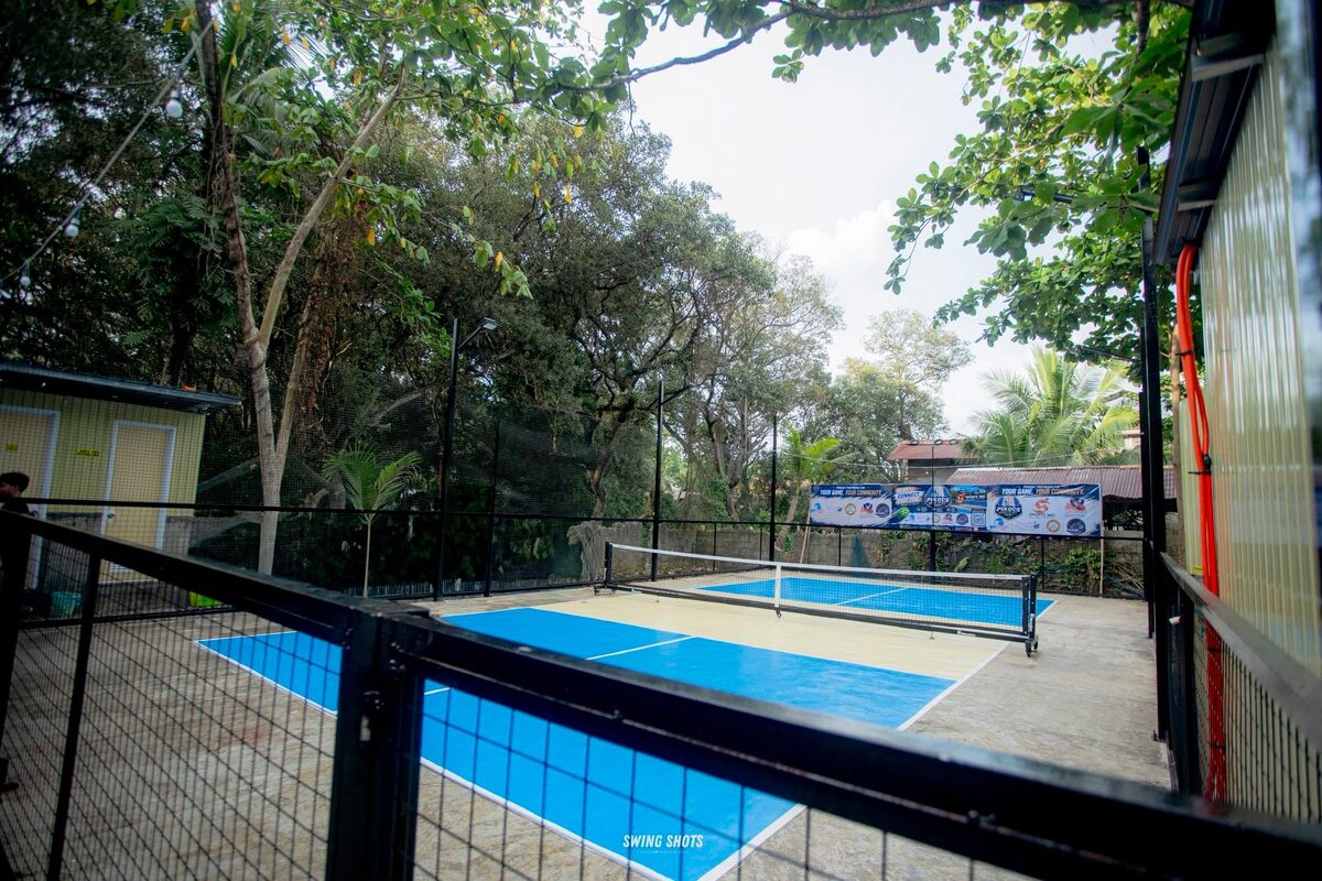PIKOLS Hideout pickleball courts surrounded by trees